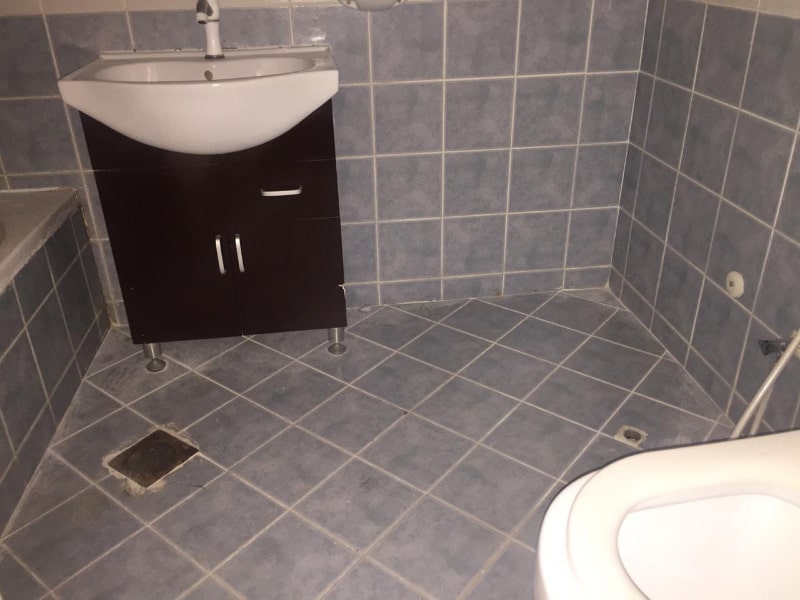 blue tiled bathroom sink