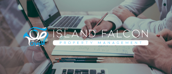 Hands collaborating over property management documents